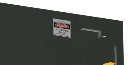 Danger sign on a dark wall.