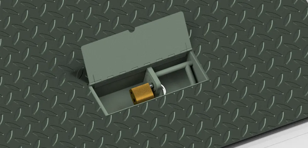 Metal box with padlock on textured surface.